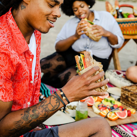 people eating sandwiches