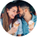A man and woman share a close laugh while enjoying reduced sugar ice cream cones.