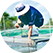 A man wearing a blue shirt with the ADM brand on the left arm is pulling a fish cage out of the water, amidst a background containing additional fish farms, including clear blue skies and green coloured water.