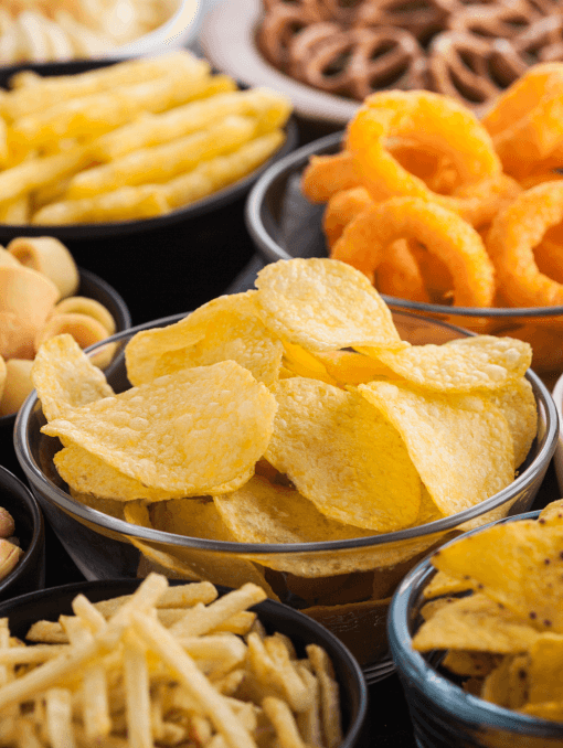 Bowls of different savory snacks