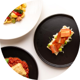 Overhead view of plates of food on a table